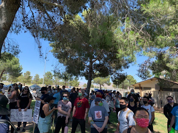 Marchers gather at LeRoy Jackson Park before the June 6 walk.