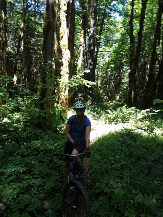 English Teacher Christine Gmitro likes to ride her mountain bike 