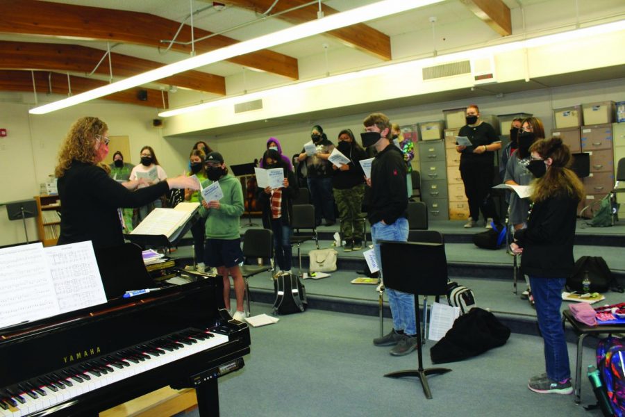 The+BHS+Choir+warms+up+for+their+performance.+