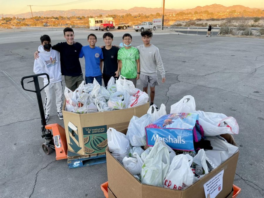 Members of the BHS California Scholarship Federation deliver part of their 2,122 lbs. of the non-perishable food they collected during Saturdays food drive to support the Salvation Army. The club also raised $212 in Red Kettle donations..  