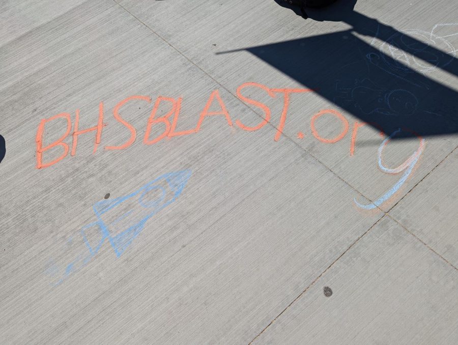 A chalk drawing by Mahnoor Ahmad and Alexander Vargas of bhsblast.org.
