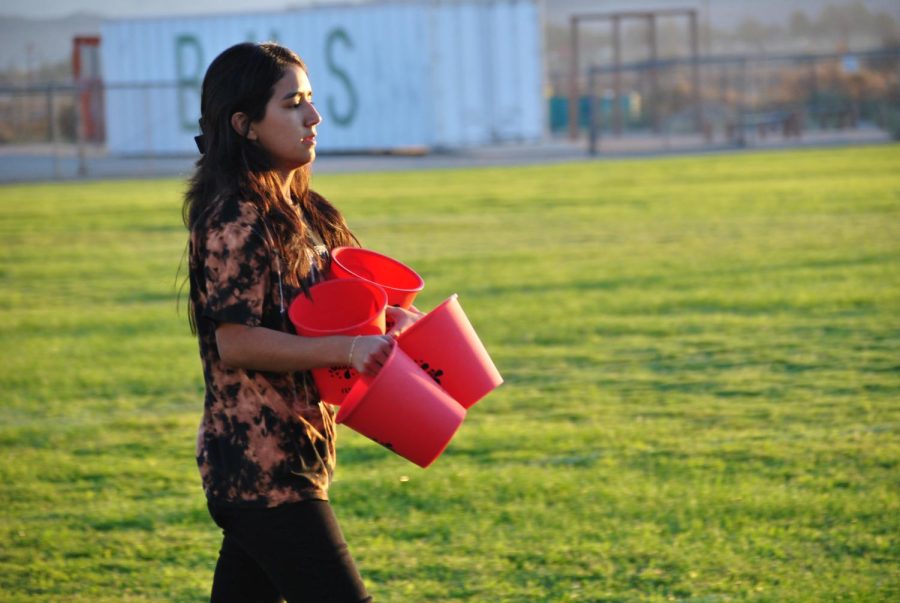 Junior Lillian Urbina works hard to make sure students have fun during the Fall Rally.