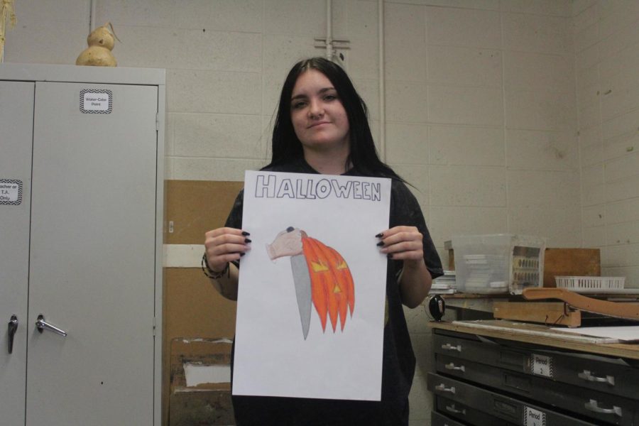 Drawing 1 student senior Raven Goyetche with her drawing project