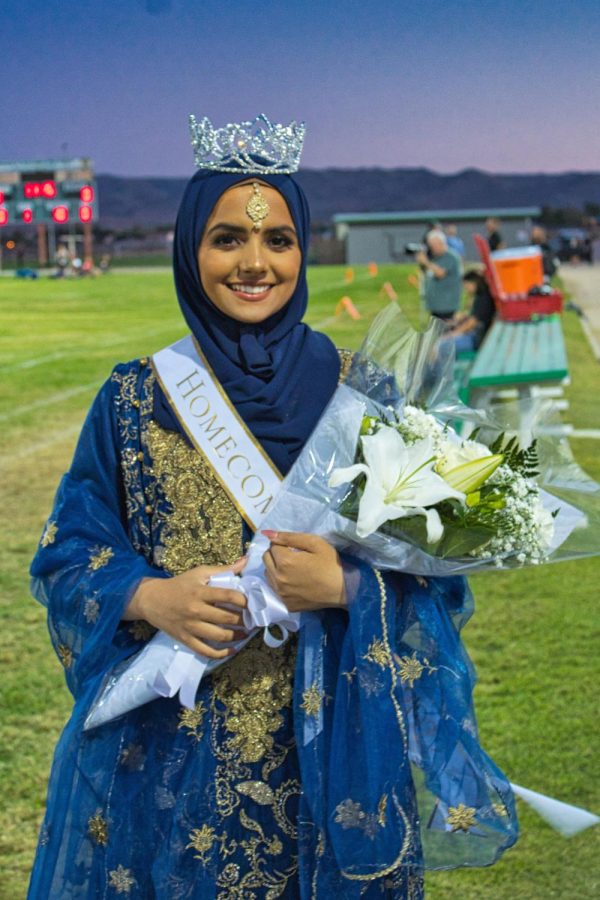 Homecoming Queen Mahnoor Ahmad wears her crown and sash with pride.