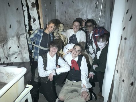 Murray Middle and Burroughs High School students Travis Dickey,  Bekah Dickey, Everett Dickey, Nathan Quick, Justin Bal,  and Tabitha Goodman pose together after a fun night of scaring people in Bal’s haunted house. 
