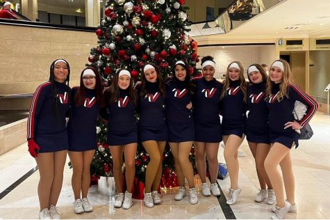 Varsity Cheerleaders Samara Rivas, Julissa Martinez, Lenae Lugo, Olivia Haas, Mika Hildreth, Araina Jones, Mackenzy Crow, Mindy Bravo, and Makynna Fruend ready for the London New Years Parade.