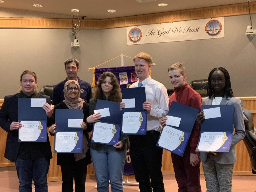 Senior Manuel Rodriguez, Senior Mahnoor Ahmad, (OPS Student), Senior Thomas Wonnacott, (homeschooled student), ICS student Apiew Thich win certificates after giving their speeches at the annual Lions Club Student Speaker contest. 