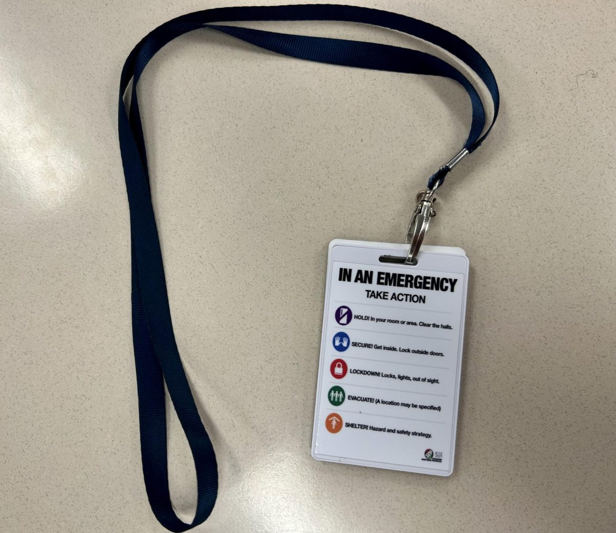 Burroughs+personnel+are+each+given+a+lanyard+with+the+new+safetry+infomation.