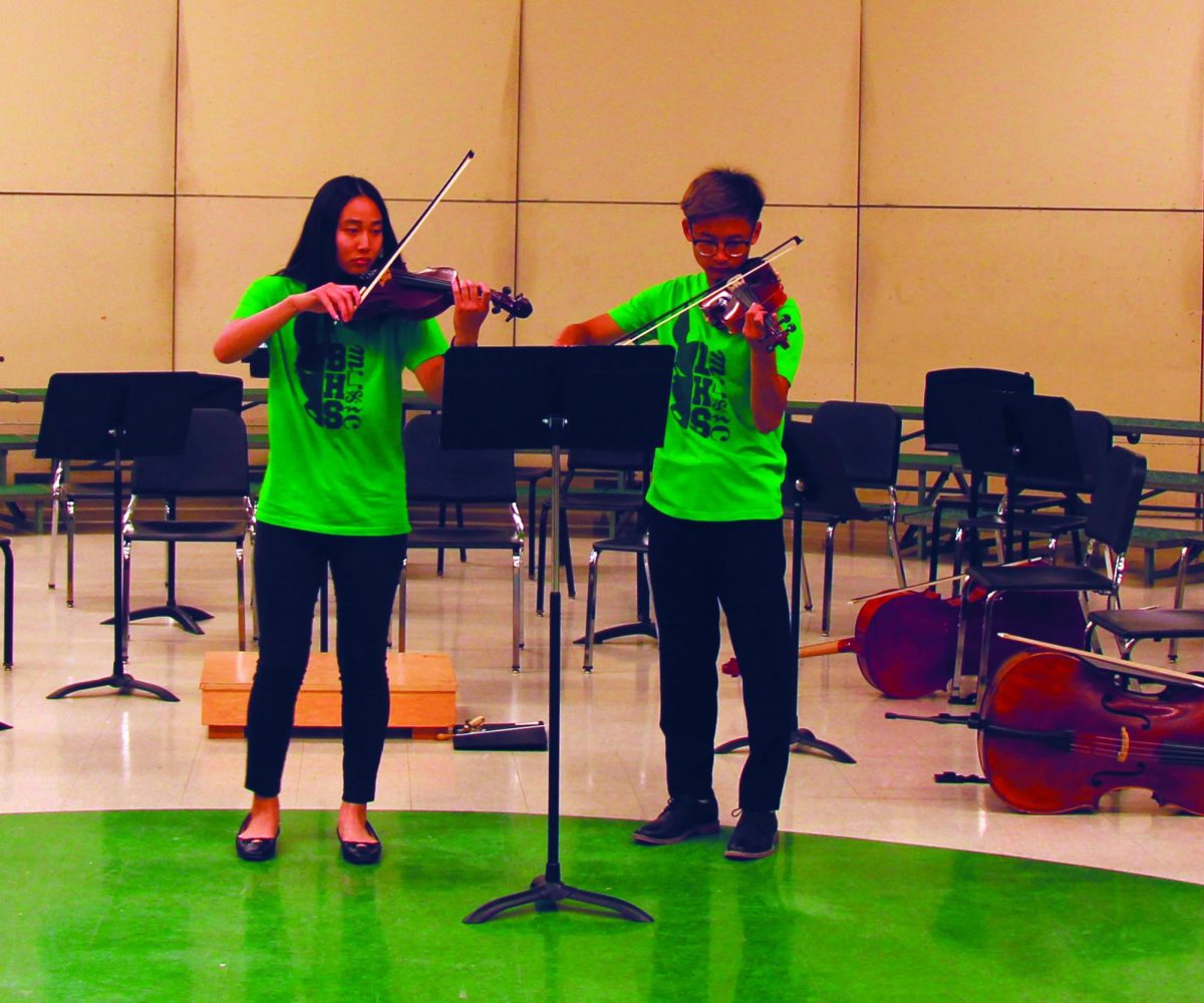 Seniors Amanda Huynh and Andrew Bui perform “Serenade” during this year’s Culture Fest.