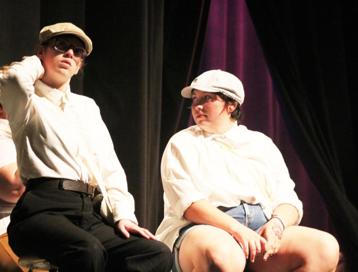 Sophomore Murolo Patchin and Olive Patterson preform together in a play.