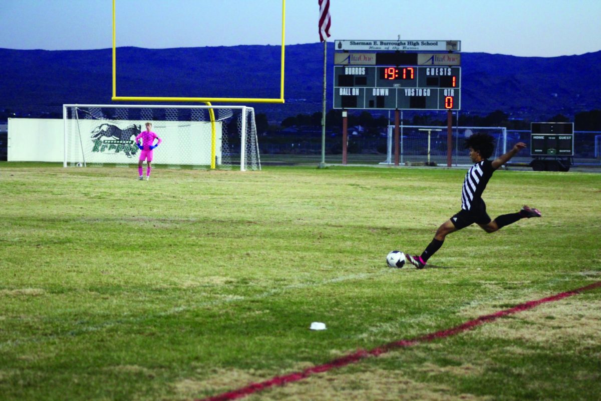 Sophomore Eligio Chavez prepares for a powerful kick at a recent game. 