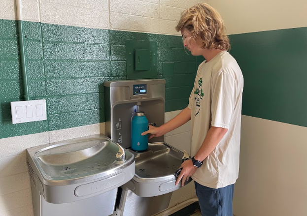 Junior Will Horning uses refillable water bottle station in multiuse room