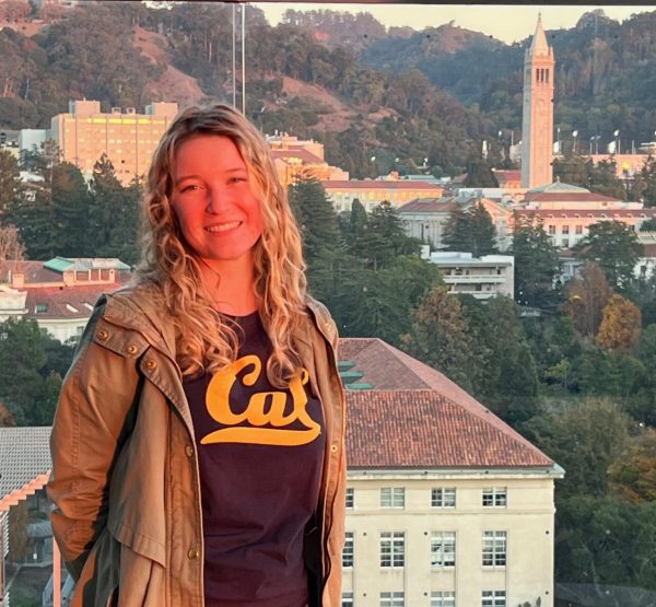 Annika Houck at UC Berkeley with the famous Campanile bell tower in the background.