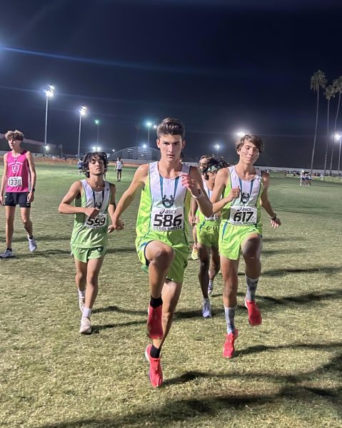 The Burroughs XC team warms up before the showdown at Cool Breeze Invitational Meet.