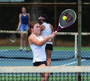 Freshman Addison Roquemore attacks the ball during a match at Rim of the World.