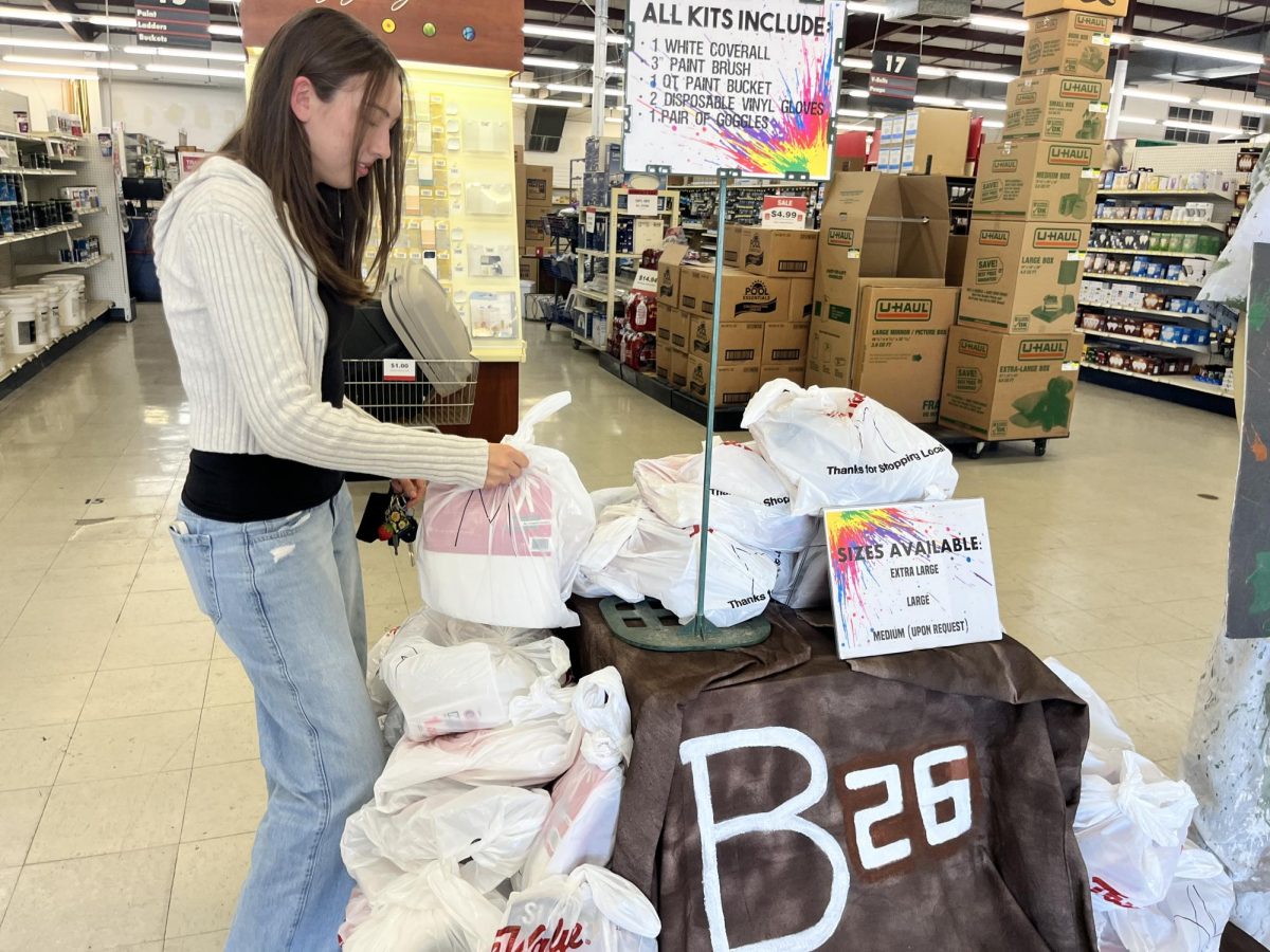 Senior Layla Goebel buys her B Mountain Kit for the upcoming senior tradition of painting B Mountain.