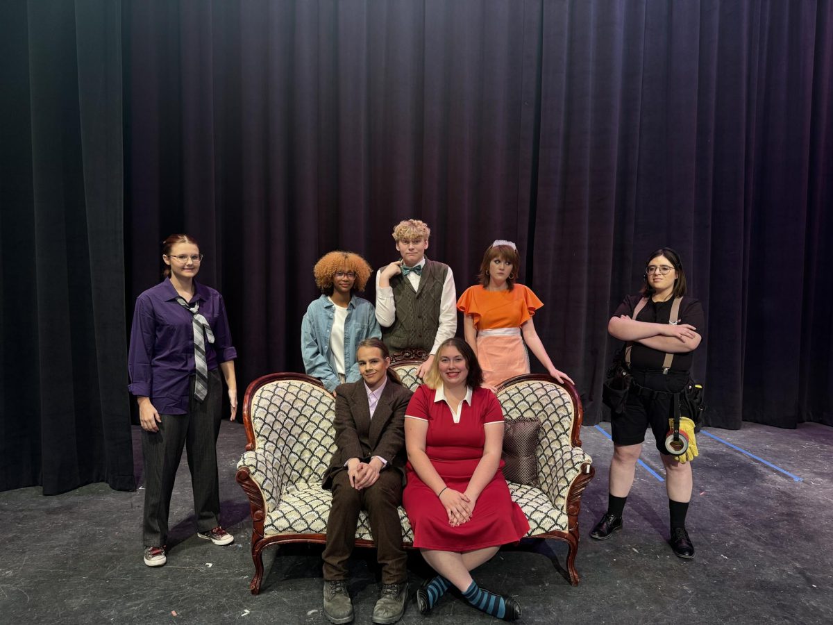 (Clockwise, from left) Castmembers Brooklyn Gillson, Tristyn Odom, Brayden Burris, Annabelle Grubbs, Murolo Patchin, Olive Patterson, and Dain Johnson are ready to entertain audiences with the final two performances of "This Murder Was Staged." 
